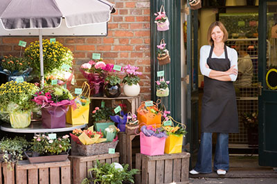 image of business owner outside shop