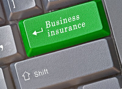 image of green business insurance keyboard button