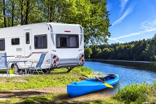 rv parked in the woods