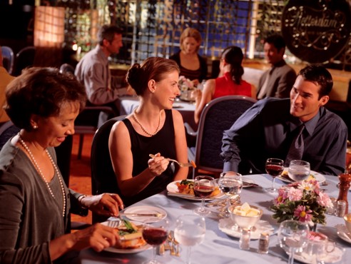 people eating dinenr at table