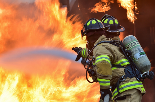 firefighters putting out a house fire