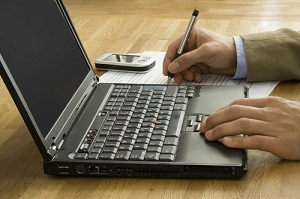 business person working on laptop